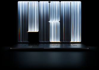 MacBook Pro con display PROLED XDR, nero siderale, lo schermo mostra un fitto motivo di oggetti simili a nastri con strisce luminose che formano la parola Pro